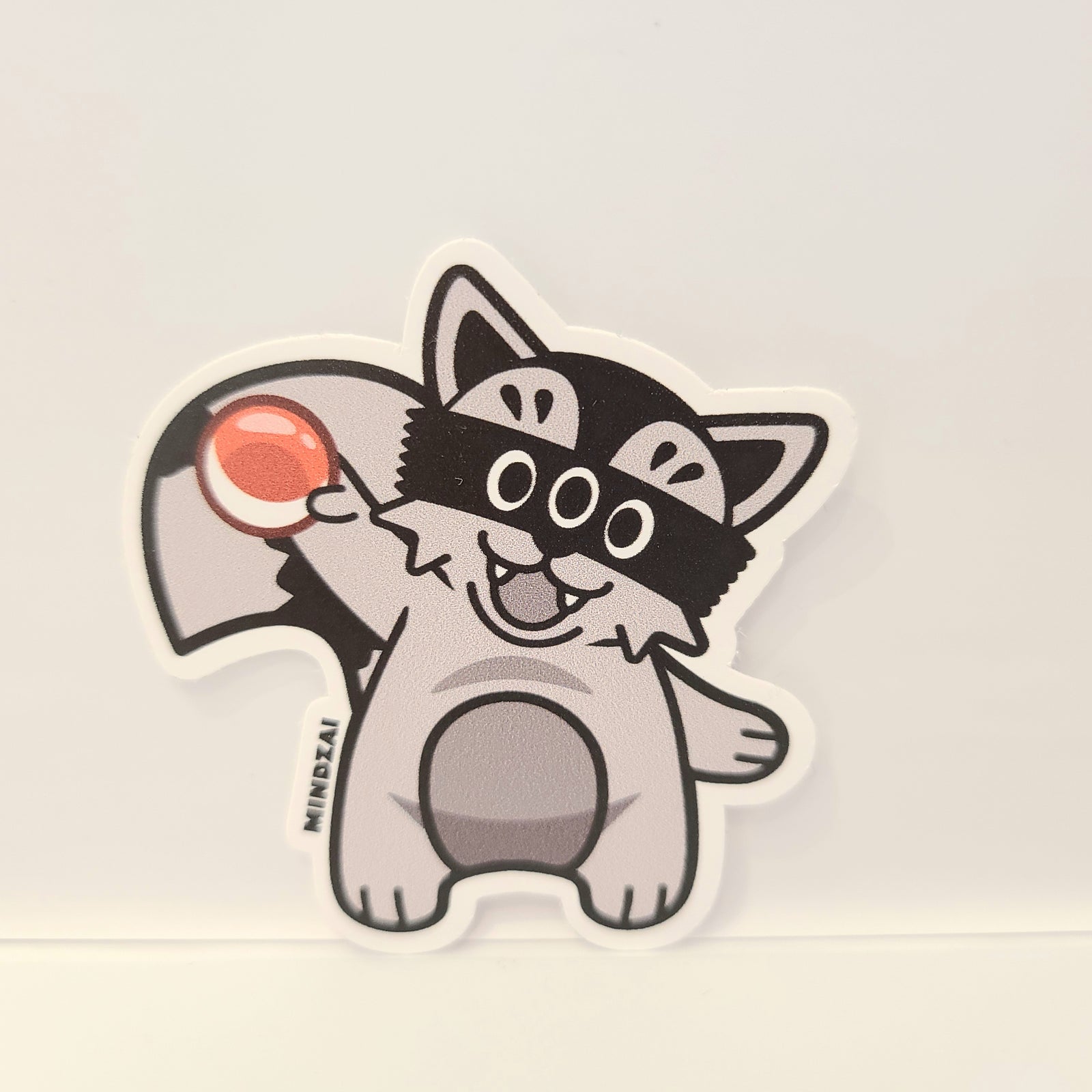 Hunter Holding Gacha Ball Medium Sticker