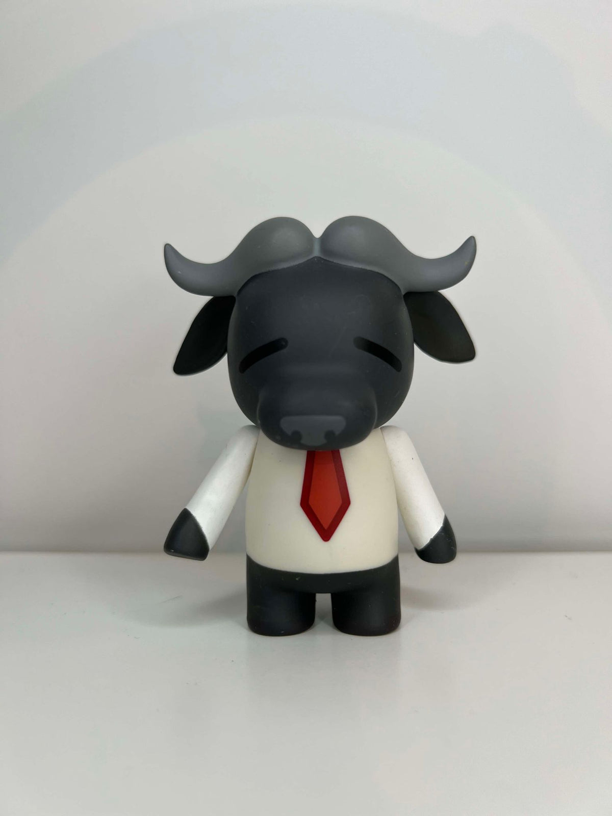 Kidrobot Aggretsuko Vinyl Mini Series Manager Buffalo - 1